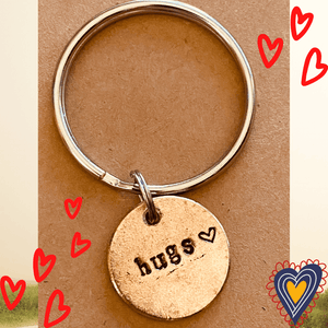 Hugs handmade bronze charm, a meaningful stocking stuffer from A Well Run Life