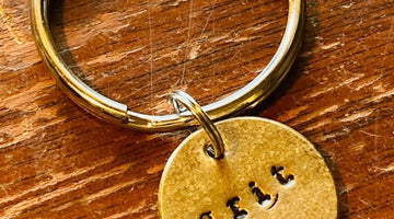 Grit handmade bronze charm, a meaningful gift for a coach from A Well Run Life