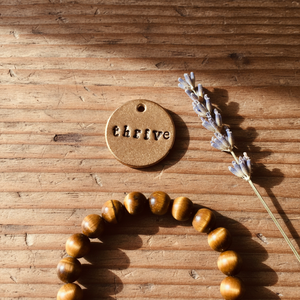 Thrive handmade bronze charm — motivational keepsake by A Well Run Life, Chandler, Arizona