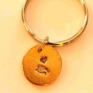Heart in Hand A Well Run Life The Heart in Hand Key Chain ($19.99) 