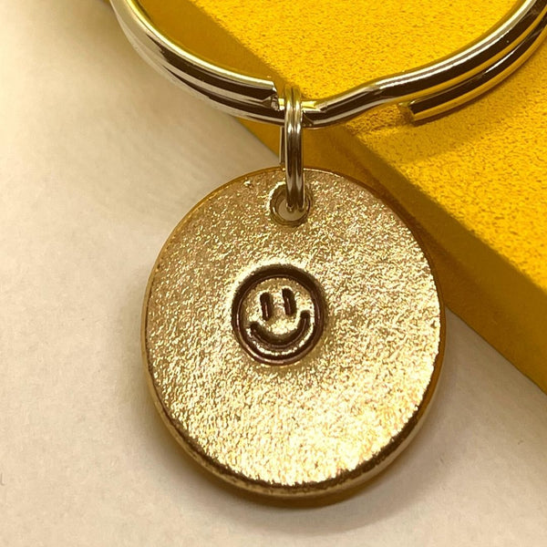 Smile! A Well Run Life Smile! Key Chain ($19.99) 