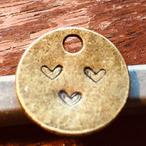 Teeny Tiny Itty Bitty Heart — dime-sized hand-stamped bronze heart charm